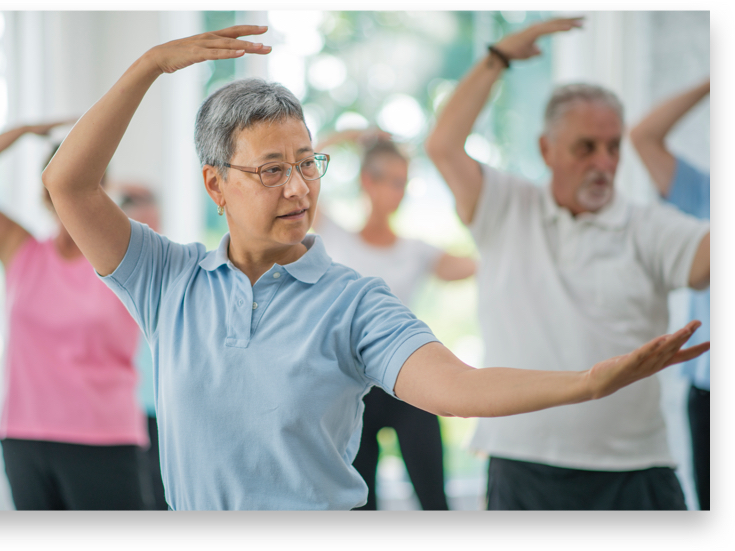 People exercising in a field